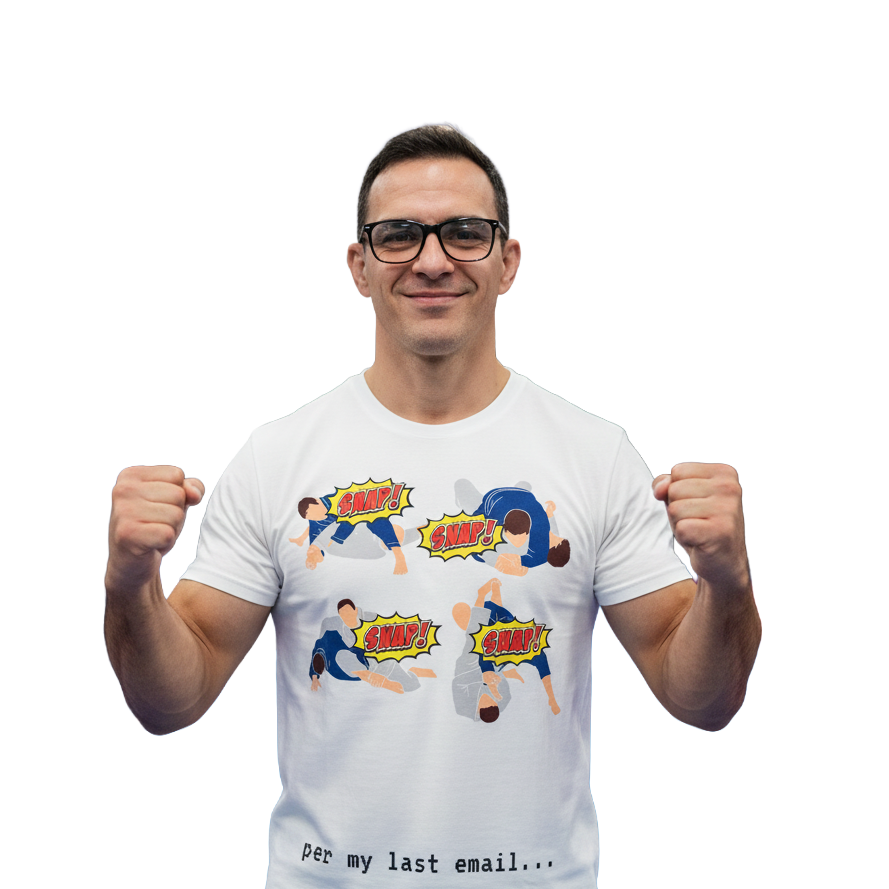 Man wearing a white t-shirt with graphic designs and text, posing with fists clenched on a white background.
